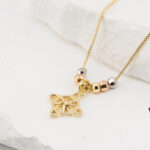 Cad. con Dije Nudo de Bruja Zirconia Oro Lam Florentino