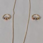 JUEGO DE BOLITAS MULTICOLOR EN ORO LAM