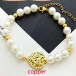 Pulsera Perla Hearts acero