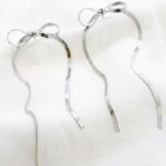 Aretes Ony en dorado y plateado