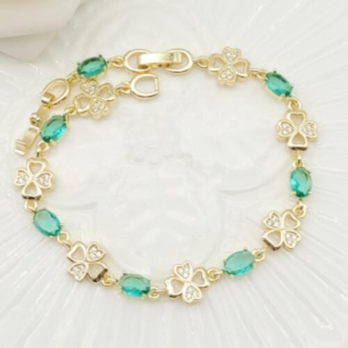Pulsera Dorada con Dijes de Trébol y Piedras Turquesa